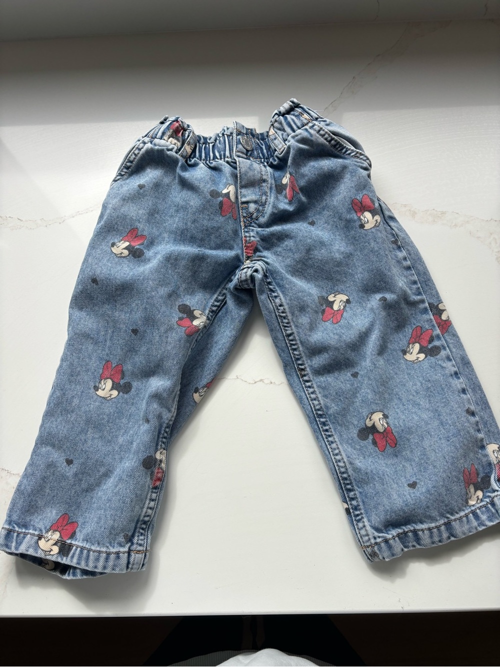H&M Light Blue Denim Minnie Mouse Jeans with Red Bow Accents